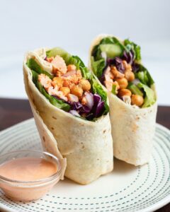 A photo of a Buffalo cauliflower wrap sandwich from Elephants Deli