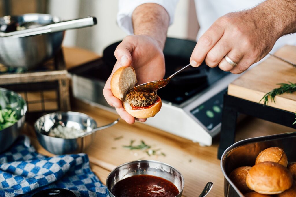 chef preparing a slider