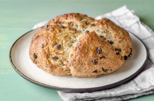 Soda Bread on a white towel and green table