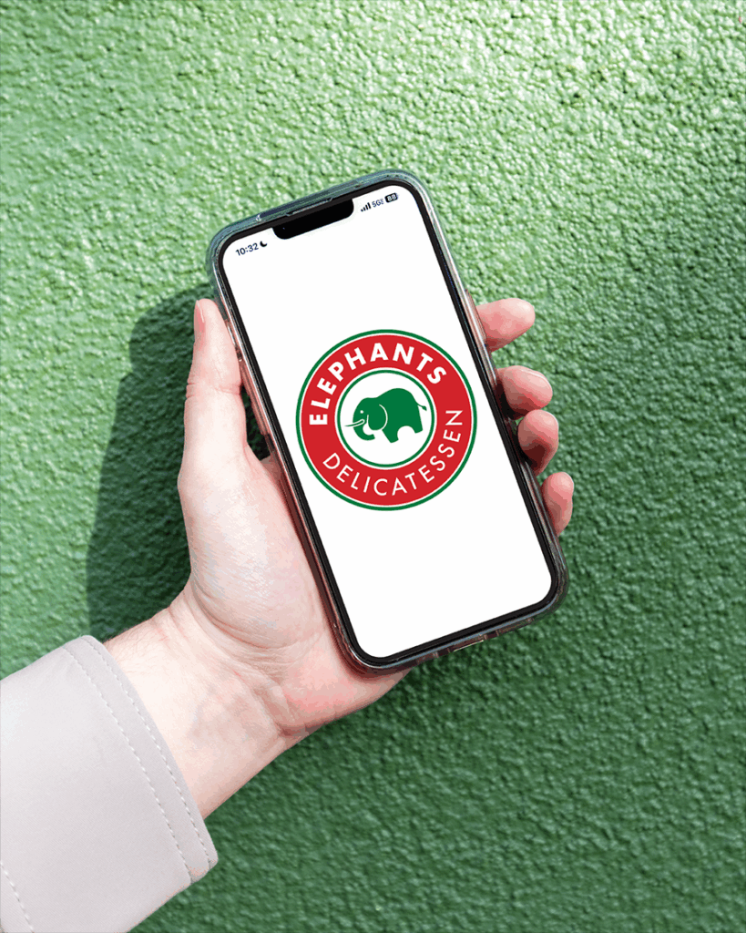 Image of Elephants app loading against green background